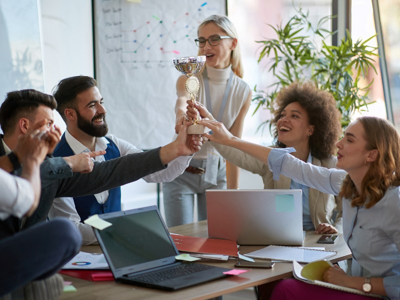 Work colleagues celebrating their achievements.  Work colleagues celebrating their achievements.