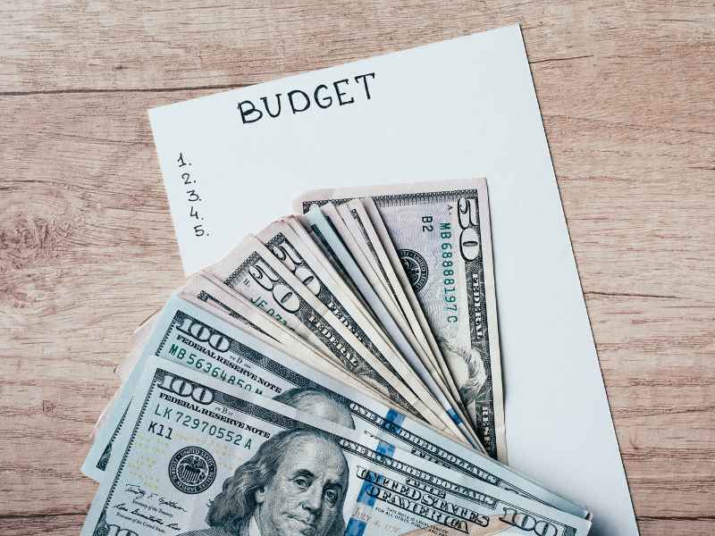 Note paper and money to plan the party budget.