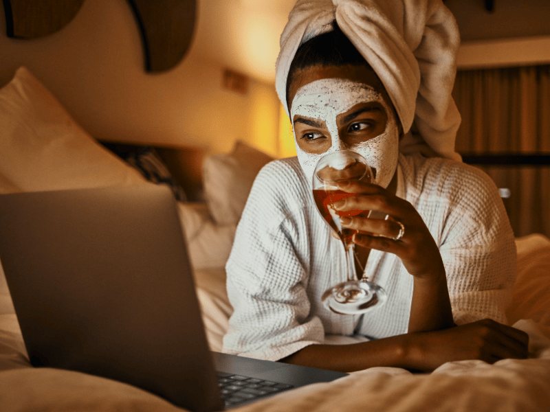 A woman with a face mask enjoying me time. A woman with a face mask enjoying me time.